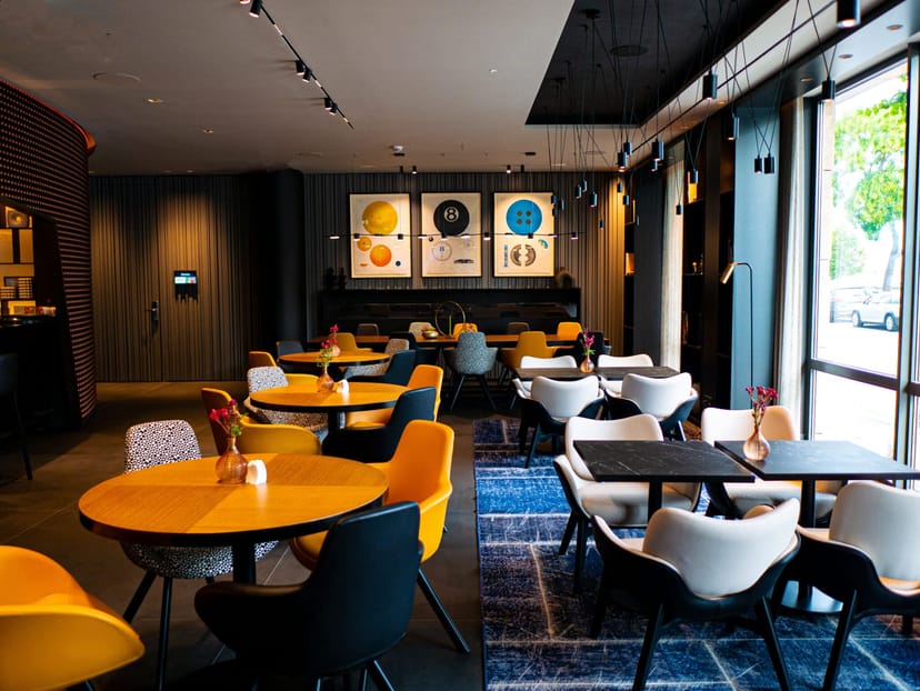 Budapest Park Plaza suite: modern lounge, colorful seating, event venue