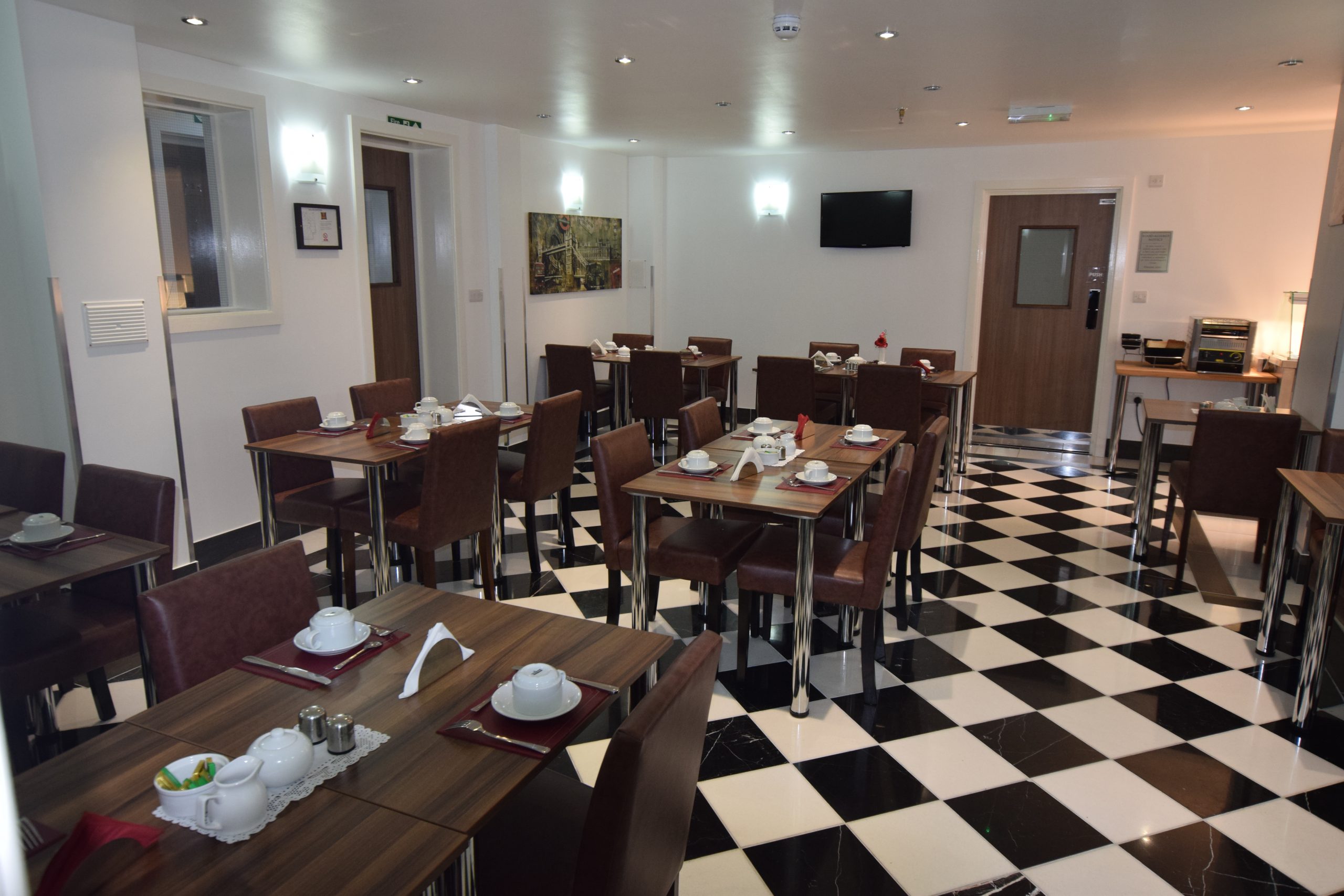 Lucky 8 Hotel breakfast, checkerboard floor, event dining
