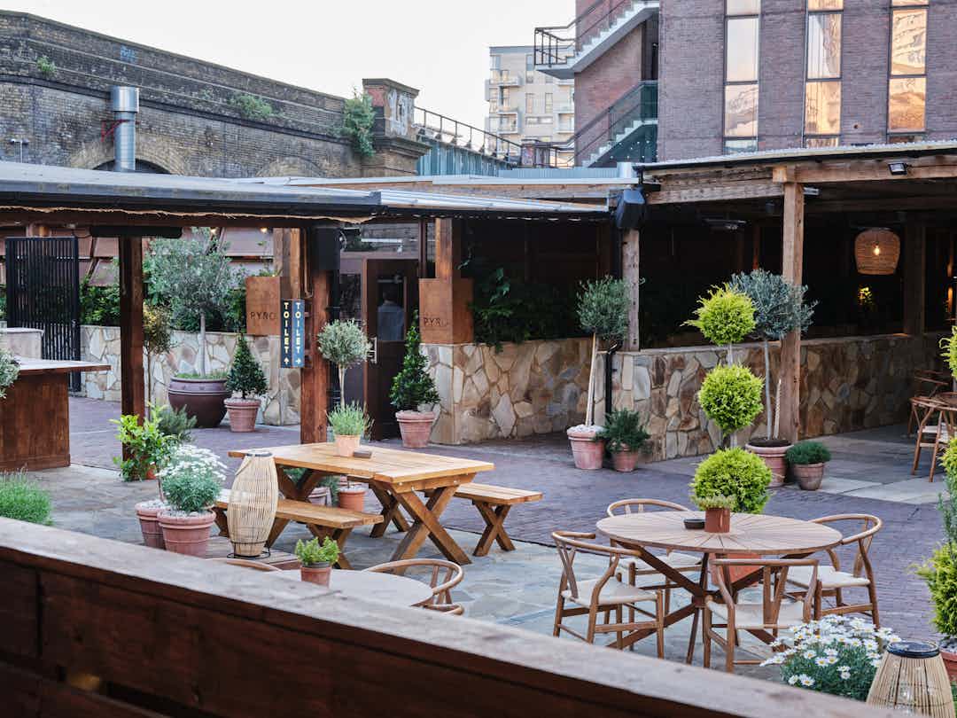 Rustic-chic outdoor event space, London Bridge reception, networking, party.
