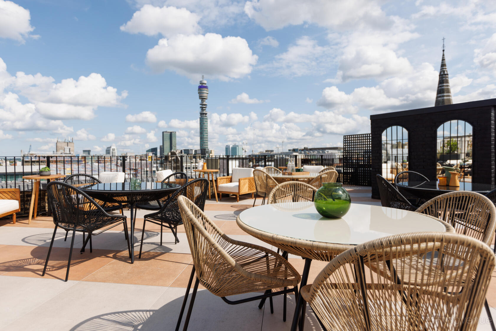 Rooftop event space, urban backdrop, cocktail reception, product launch