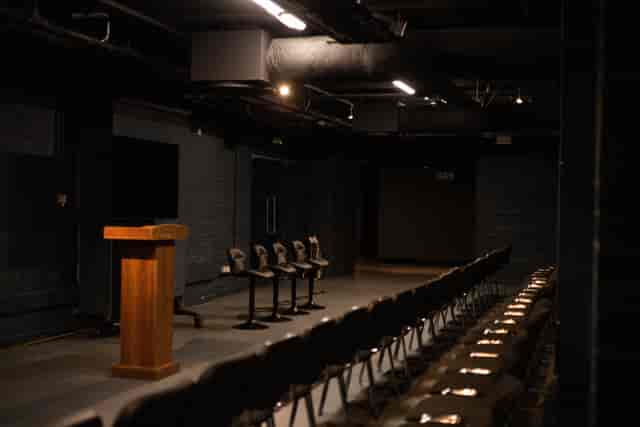 SPYSCAPE event, podium, tiered seating, workshop
