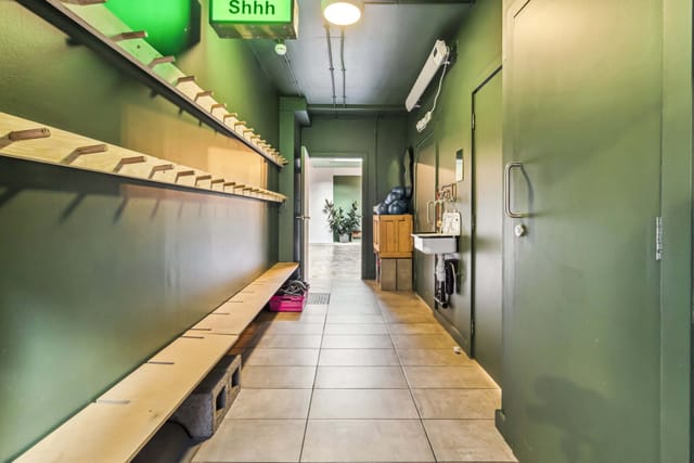 Waking Dreams Bethnal Green: Backstage coat rack, bench seating, event venue
