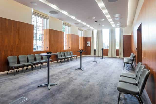 Lovelace Room London event space, wood paneling, breakout session