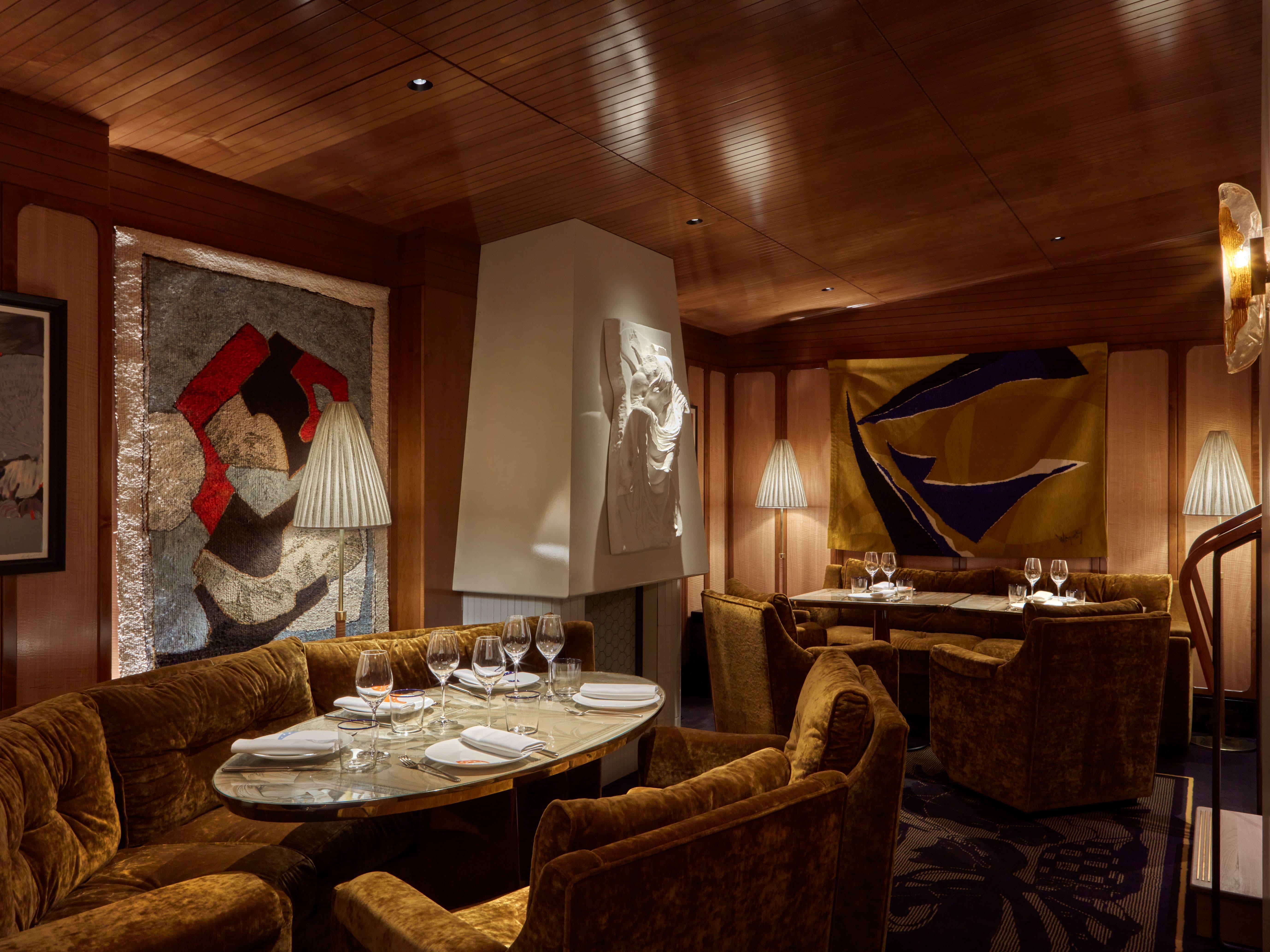 Executive dinner setting at Il Gattopardo, plush seating for private board meeting events.