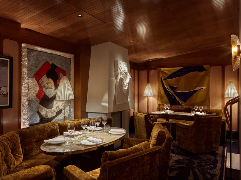 Executive dinner setting at Il Gattopardo, plush seating for private board meeting events.