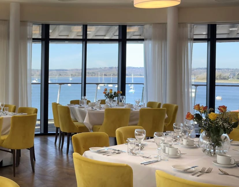 Waterfront Suite at RNLI College, airy dining space for corporate luncheons and social events.