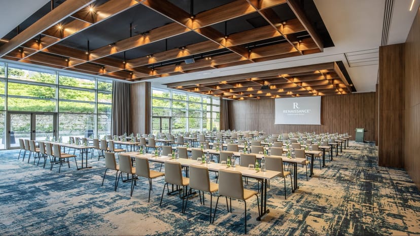 Modern boardroom with coffered ceiling for corporate events and professional meetings.