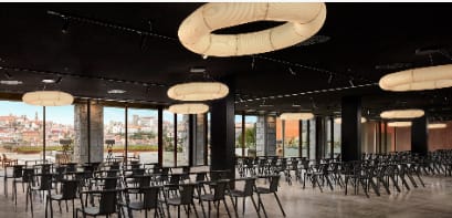 Modern conference room with ring lighting for corporate presentations and networking events.