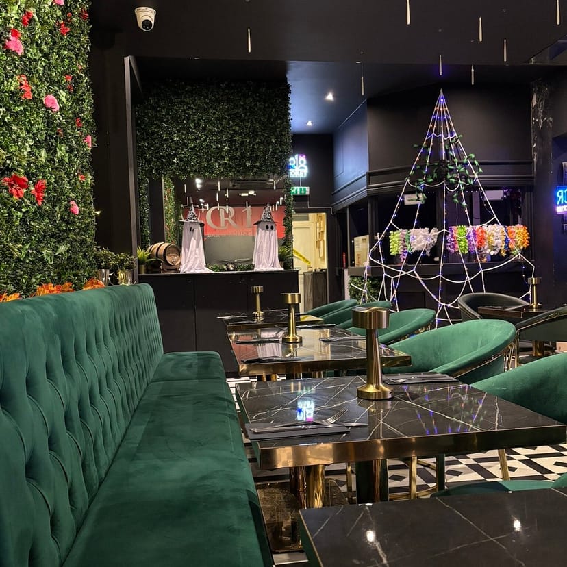 The Leaf Room at CR1 Bar & Lounge featuring upscale Halloween themed decor for luxury events.