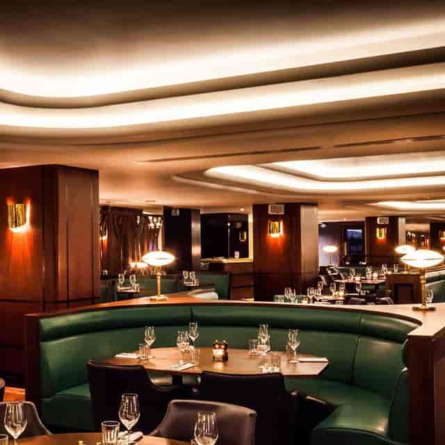Hawksmoor Air Street bar with leather banquettes for networking and corporate dinners.