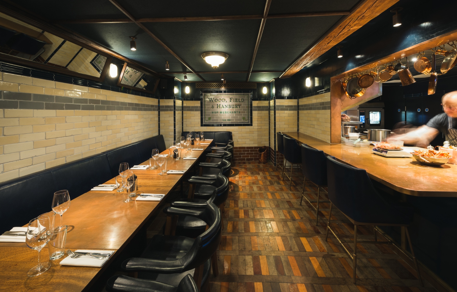Private dining room at Hawksmoor Borough with industrial aesthetic for corporate board dinners.