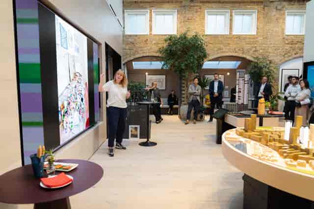 Main Gallery stakeholder briefing venue featuring AV display for brand activations and presentations.
