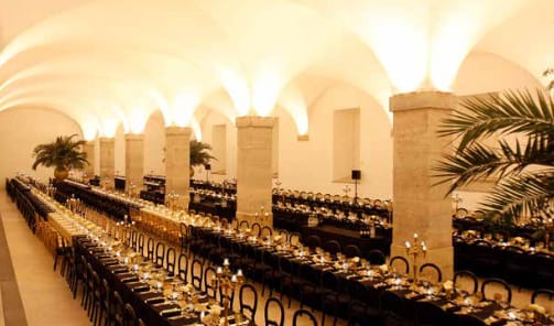 Patio da Galé banquet setup with vaulted ceilings for an elegant corporate gala or dinner.