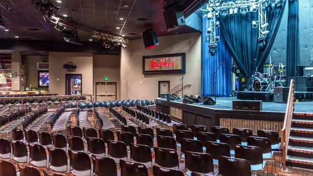 Railhead venue at Boulder Station: stage and theater seating for corporate events and presentations.