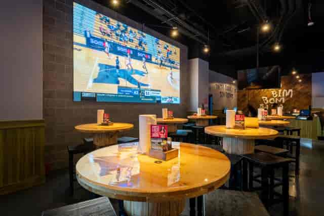 JefeBet Event Center with AV setup for corporate networking and social events.