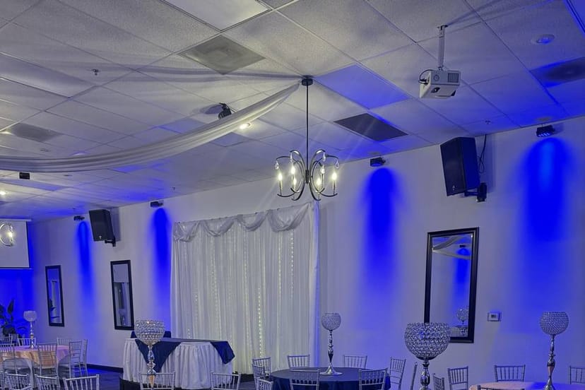 Main Banquet Hall at Prestige Event Center with uplighting for wedding and corporate event venue.
