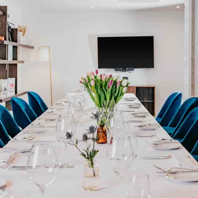 Boardroom-style private dining at CORD Restaurant, ideal for executive meetings and VIP lunches.