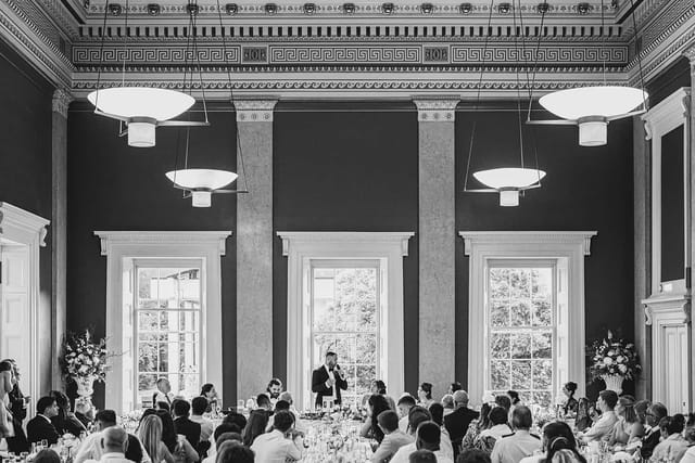 Elegant banquet setup in Downing College's College Hall for formal events and receptions.
