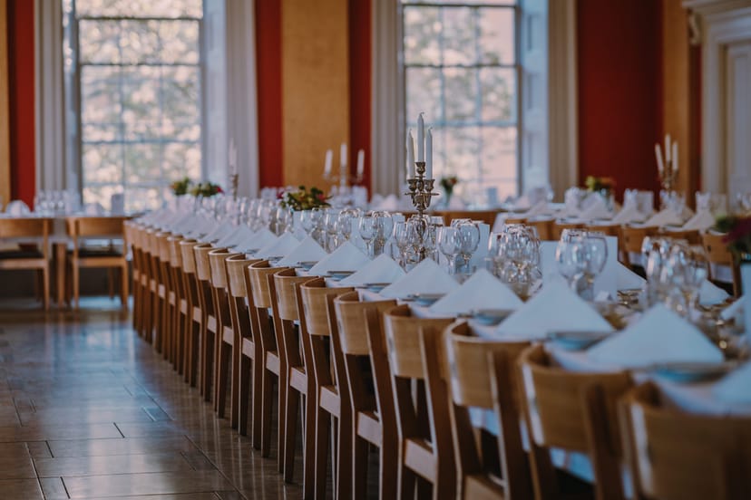 College Hall banquet setup at Downing College for formal events and wedding receptions.