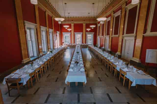 College Hall banquet setup at Downing College for formal events and high-capacity conferences.