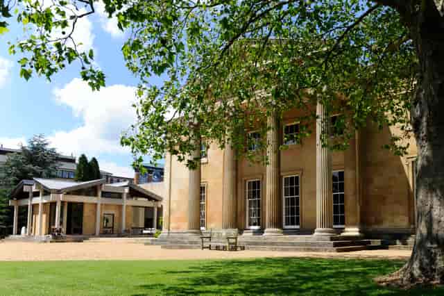 Downing College Fellows' Garden: Neoclassical venue for corporate retreats and weddings.