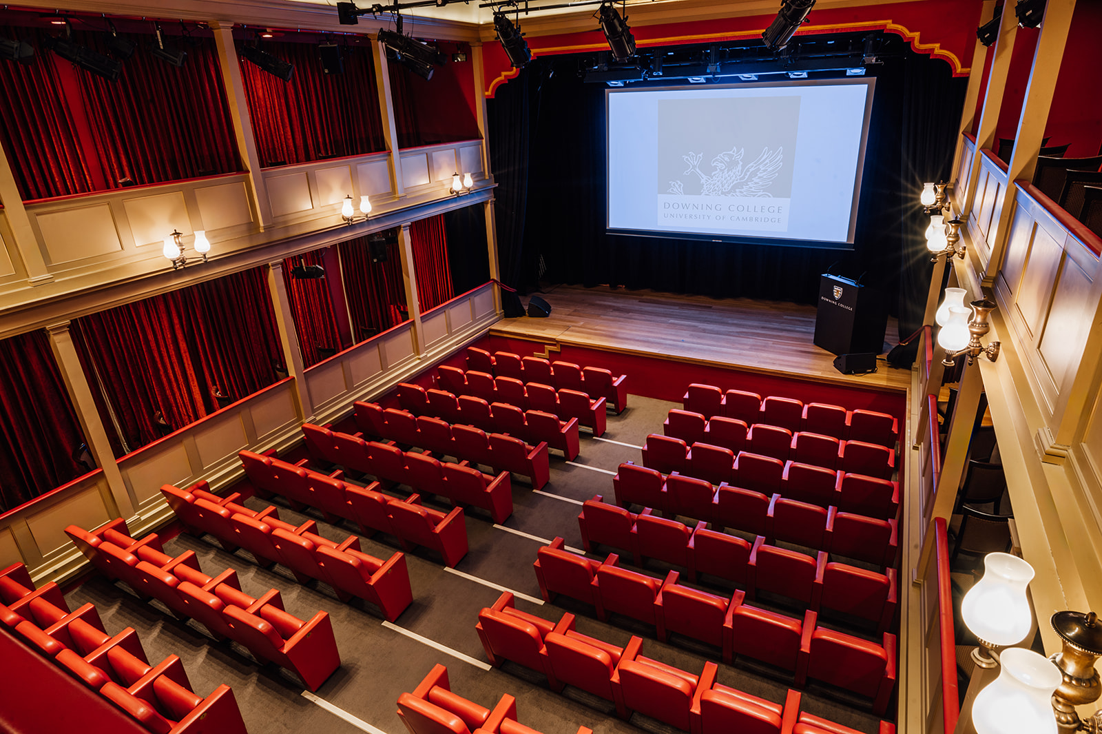 Howard Theatre auditorium with tiered seating, ideal for corporate conferences and lectures.