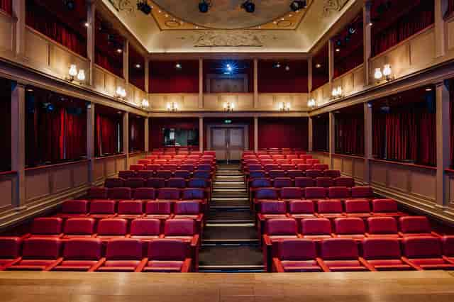 Howard Theatre tiered auditorium for professional keynote presentations and academic events.