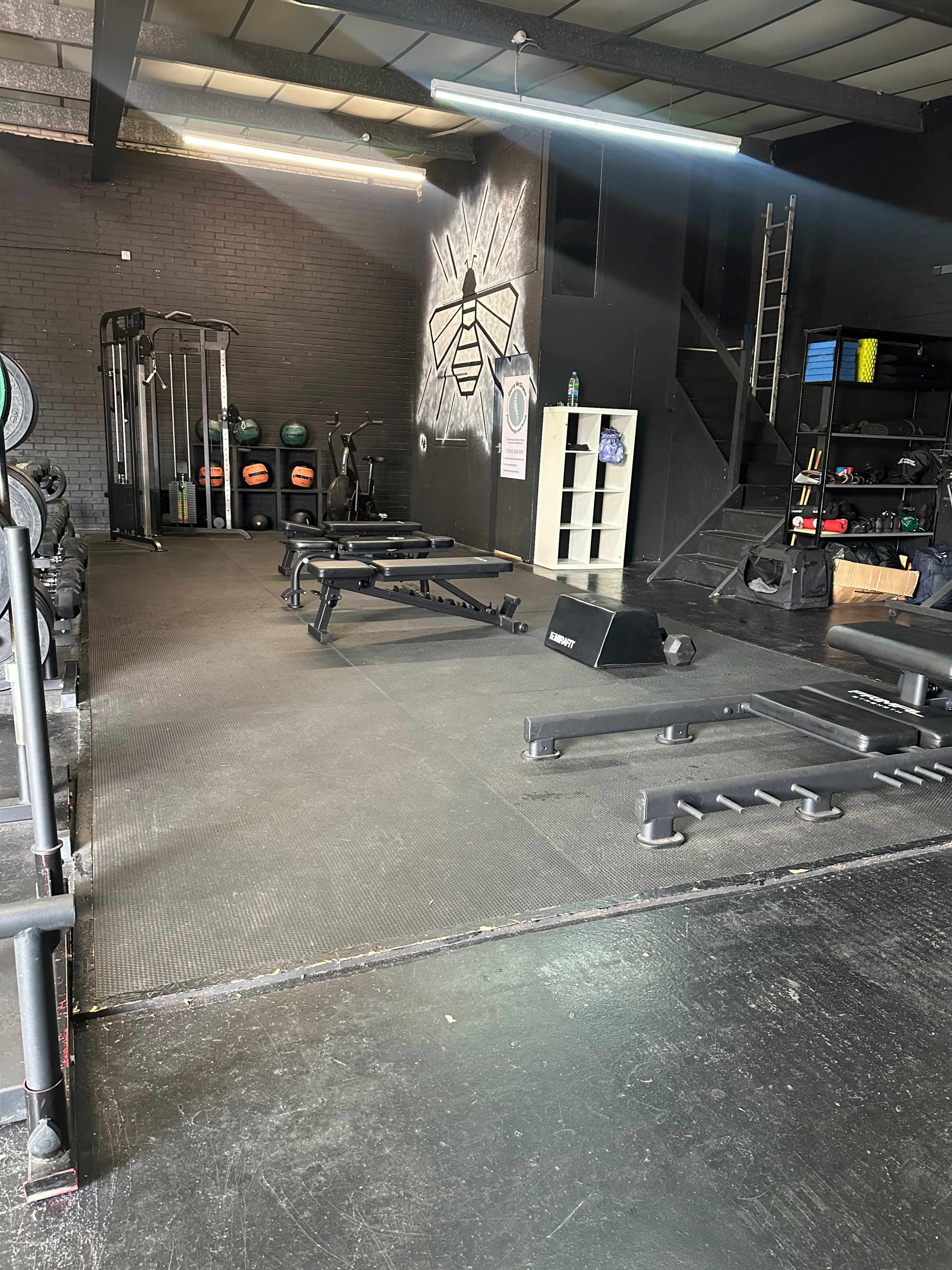 CrossFit Ancoats main training floor with industrial equipment for unique corporate fitness events.