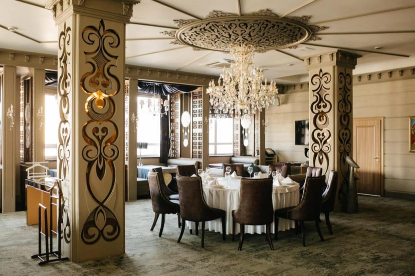 VIP dining room at Jumbaktas Hotel with ornate columns for upscale business meetings and events.