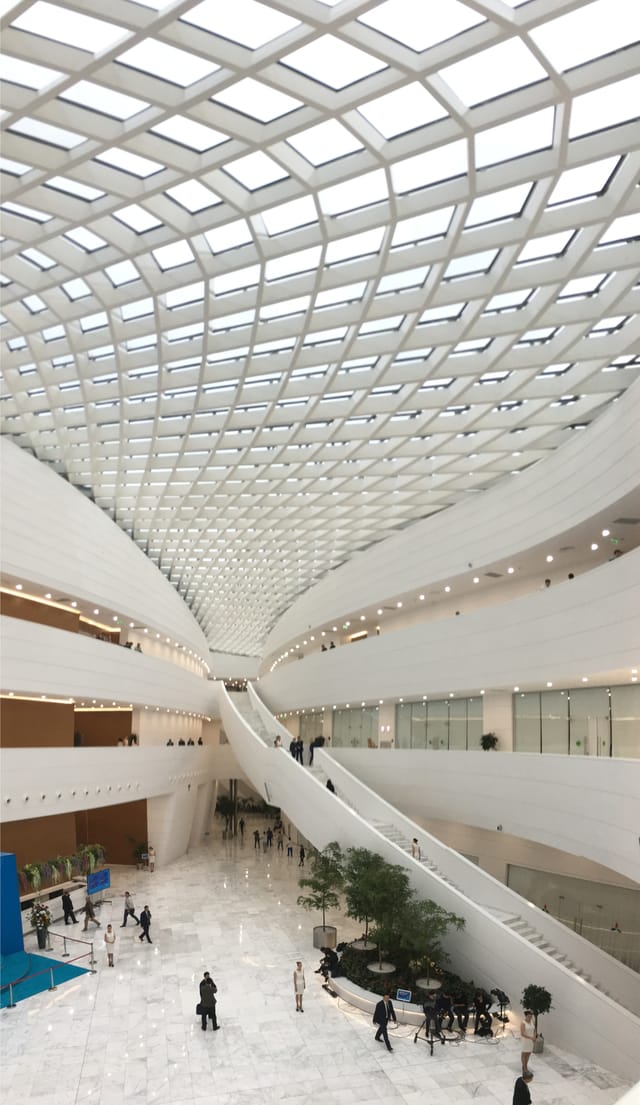 ALATAU Hall Astana: Geometric skylight atrium for modern trade show and brand activation events.