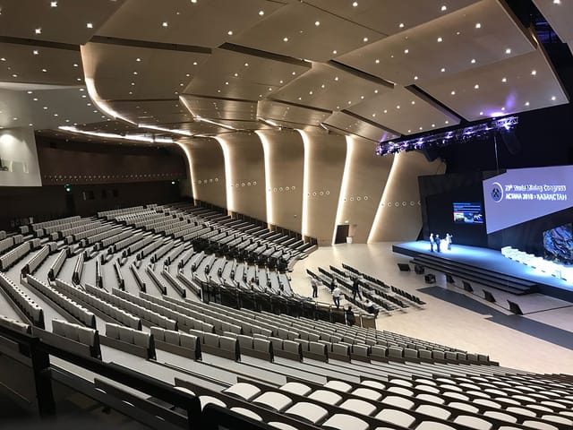 Modern ASPAN amphitheater at Korme Exhibition Center for corporate keynote or conference venue.
