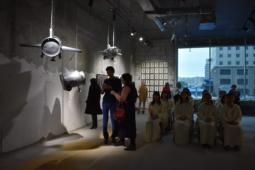 ALATAU Hall industrial venue with immersive lighting for corporate events and art exhibitions.