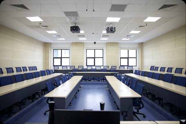 Blue Hall training room, U-shaped seating for corporate workshops and seminars.