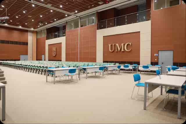 Green Hall auditorium at Nazarbayev University, classroom-style layout for conferences and events.