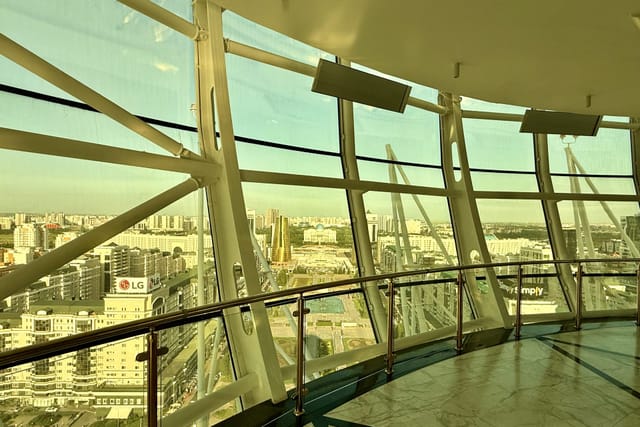 Baiterek Tower event hall with panoramic city views for cocktail receptions and product launches.