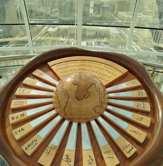 Baiterek Tower event hall with radial ceremonial stage for international summits and conferences.