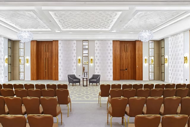 Baiterek Tower ballroom, theater-style setup for luxury corporate and social events.
