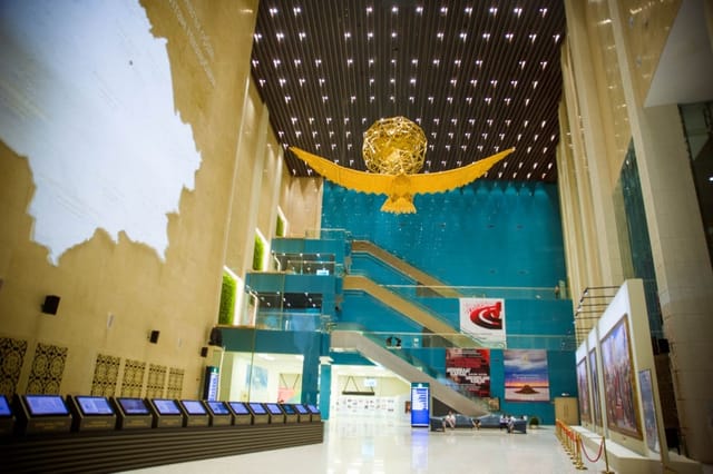 National Museum of Kazakhstan foyer: monumental gala venue and event registration space.