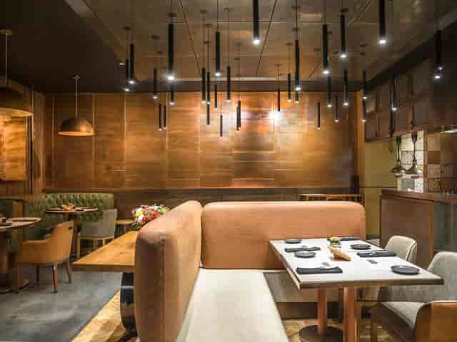 The Shed at Social House Nairobi: Semi-private booth seating for professional networking dinners.