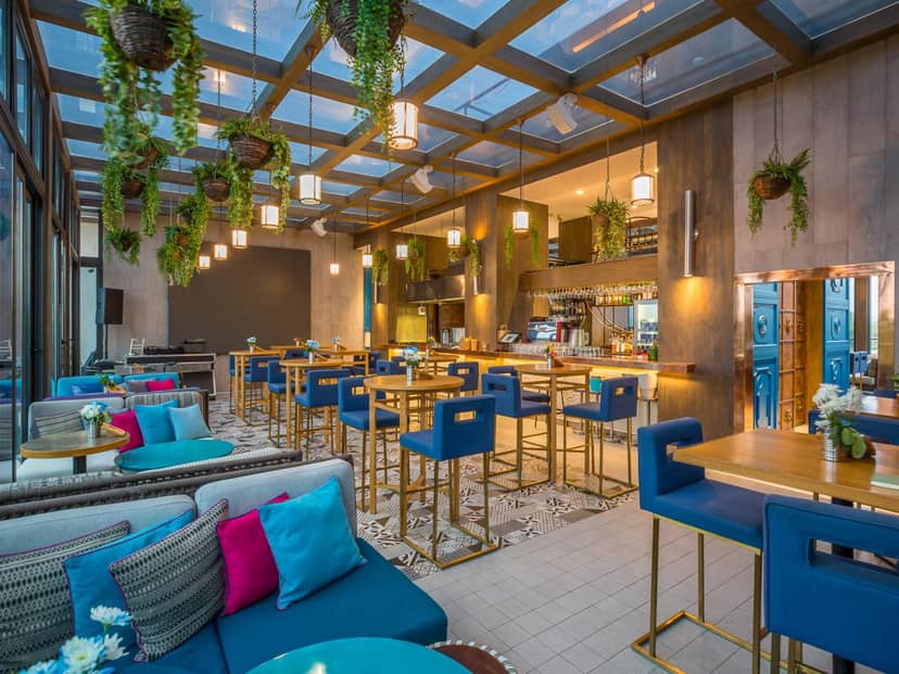 Modern biophilic Garage 1 venue at The Social House Nairobi for corporate networking mixers.