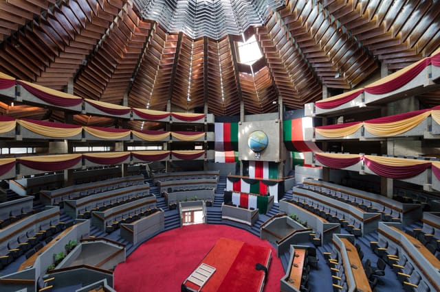 KICC Amphitheatre tiered plenary venue for formal government summits and parliamentary debates.