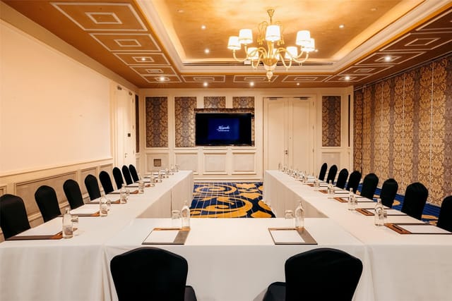 U-shaped boardroom at Villa Rosa Kempinski, ideal for luxury executive meetings and conferences.