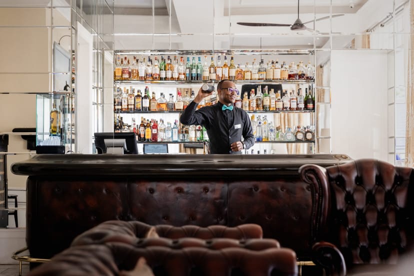 Hemingways Nairobi bar: VIP networking lounge with classic leather furniture for corporate events.