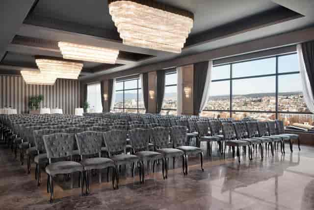 Wyndham Grand Tbilisi ballroom with tiered chandeliers for corporate events and conferences.