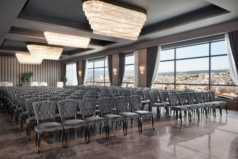 Grand Ballroom theater setup with city views for executive presentations and corporate events.