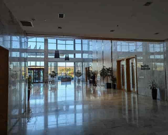 Marble-finished Hualing Ballroom foyer for corporate event registration and conference branding.