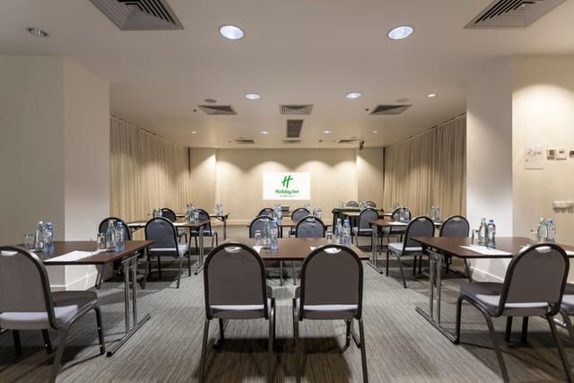 U-shaped meeting room at Holiday Inn Tbilisi, ideal for corporate workshops and training sessions.