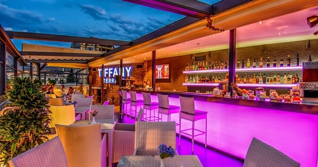 Modern rooftop bar in Tbilisi at Tiffany Bar, ideal for evening cocktail reception events.