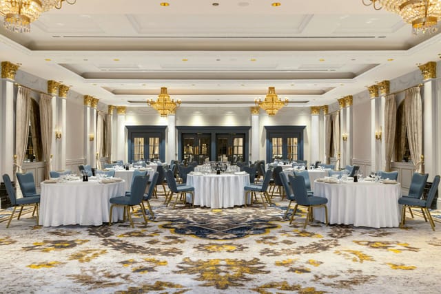 Grand Ballroom at Courtyard Marriott Tbilisi with crystal chandeliers for gala and corporate events.