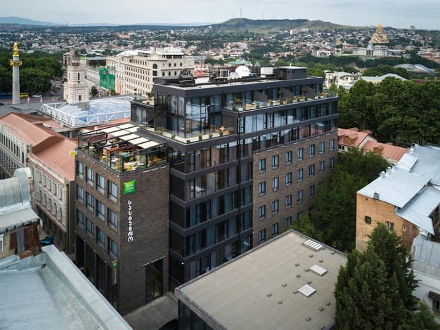 Stamba Hotel rooftop venue with panoramic city views, ideal for corporate receptions and events.